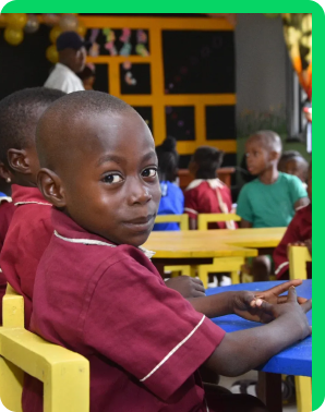 A pupil in class at the Early Childhood Development Centre