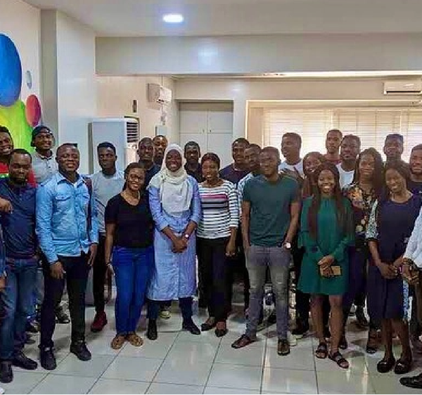 Young professionals at a Seamfix Foundation empowerment session